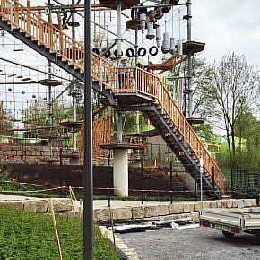 MKG employees building the fence around the climbing tower
